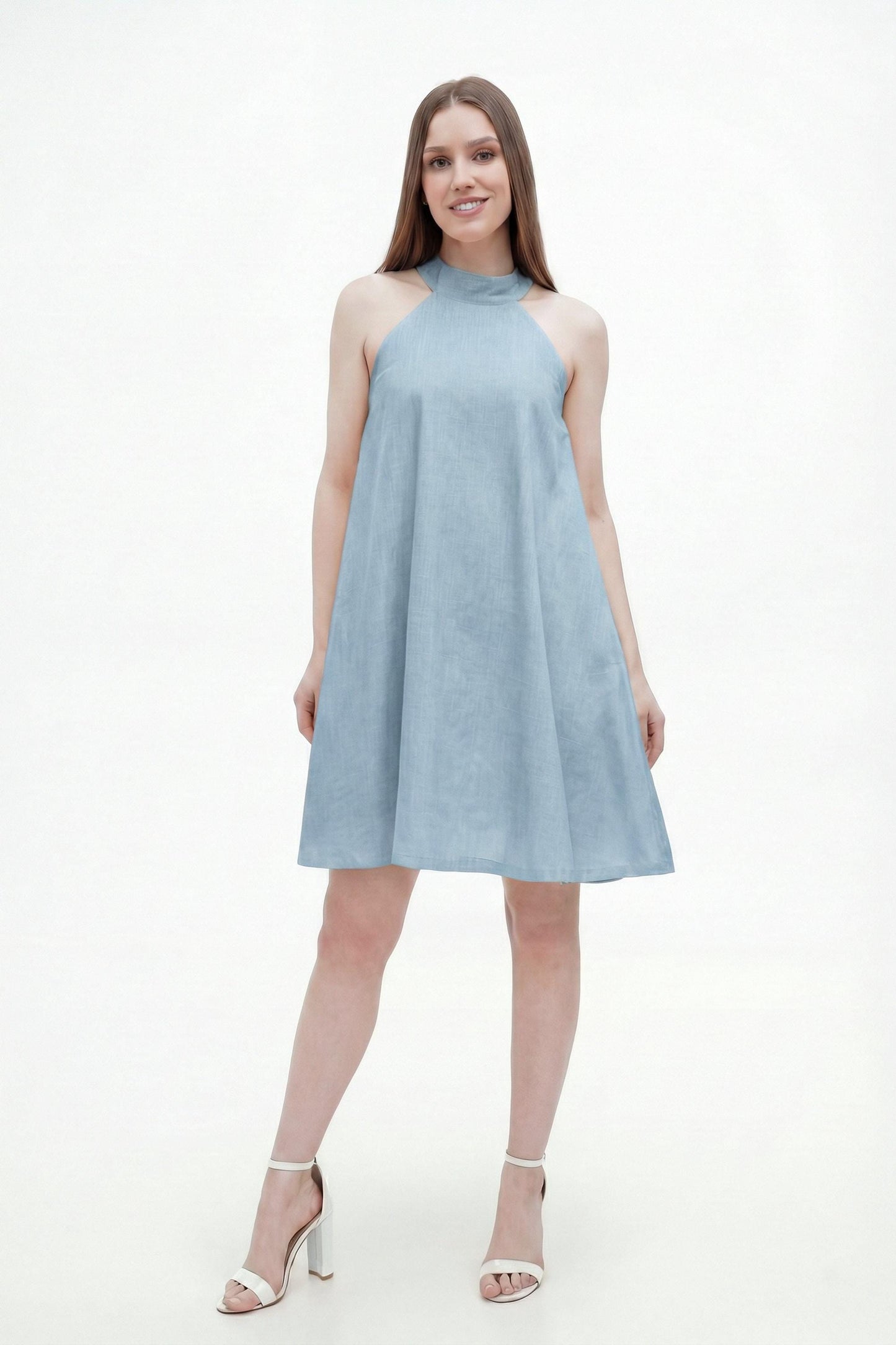 Woman wearing sky blue halter mini dress
